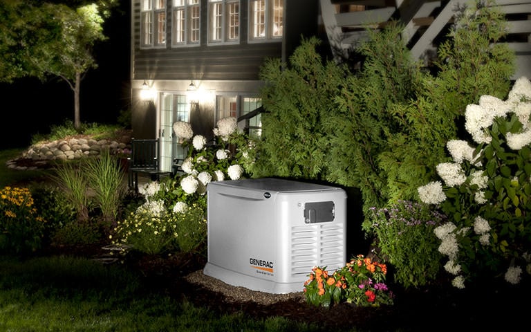 GenCo South Carolina technicians expertly installing a backup generator at a Burton home, under the clear SC skies