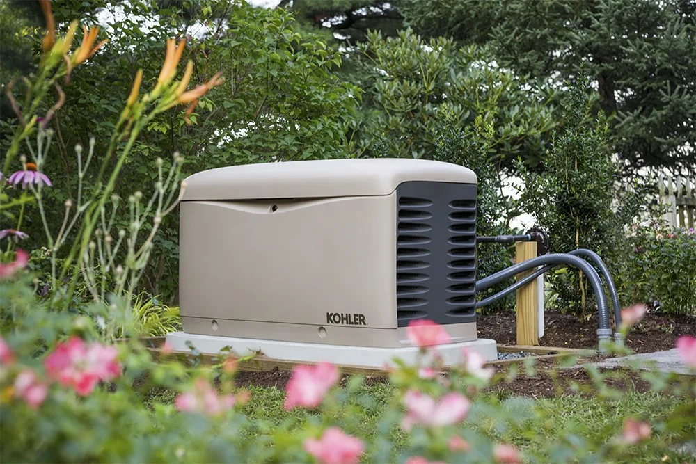 GenCo South Carolina technicians installing a KOHLER residential generator in a Port Royal, SC home